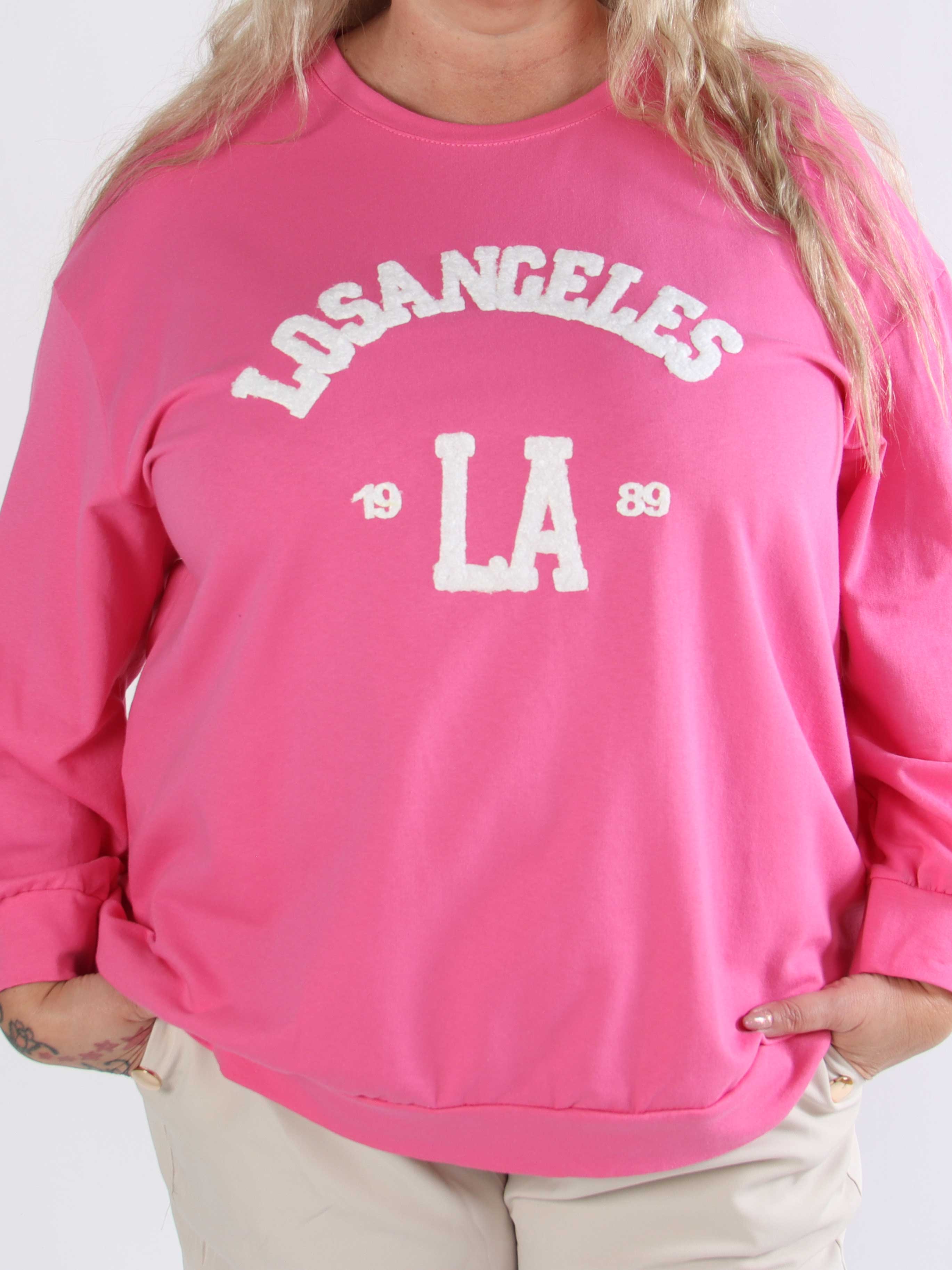 Magnolia - Plus size joggingtopp med LA skrivet i plysch